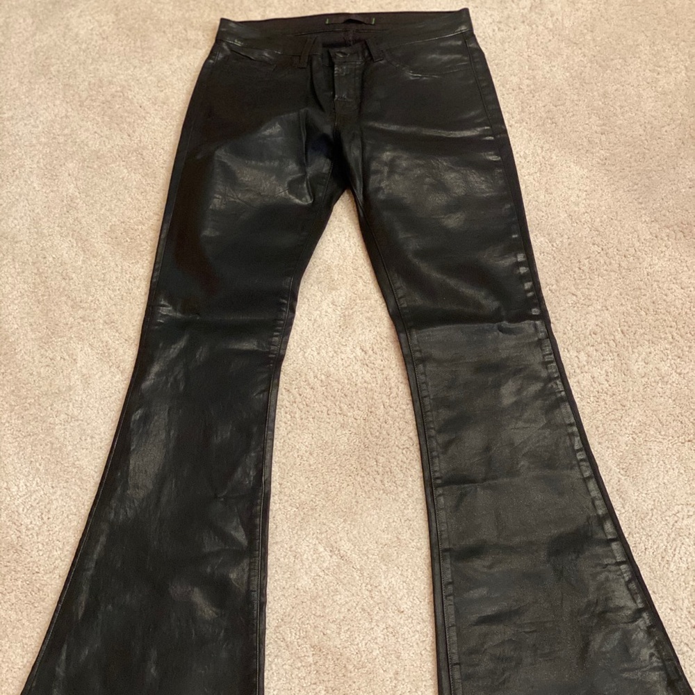 Wax coated designer jeans